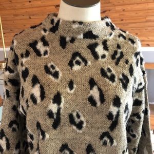 Fuzzy leopard print mock turtle neck sweater